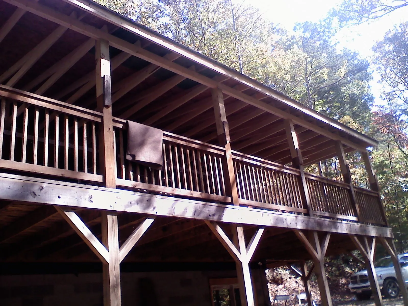 Timber framing under a new elevated porch and deck — Roof Leak Repair in Sanborn by Roofing Brothers